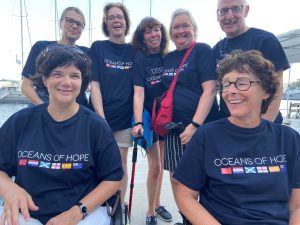 7 participants pose for the cameras in their Oceans of Hope t-shirts during a challenge event in Croatia 2018